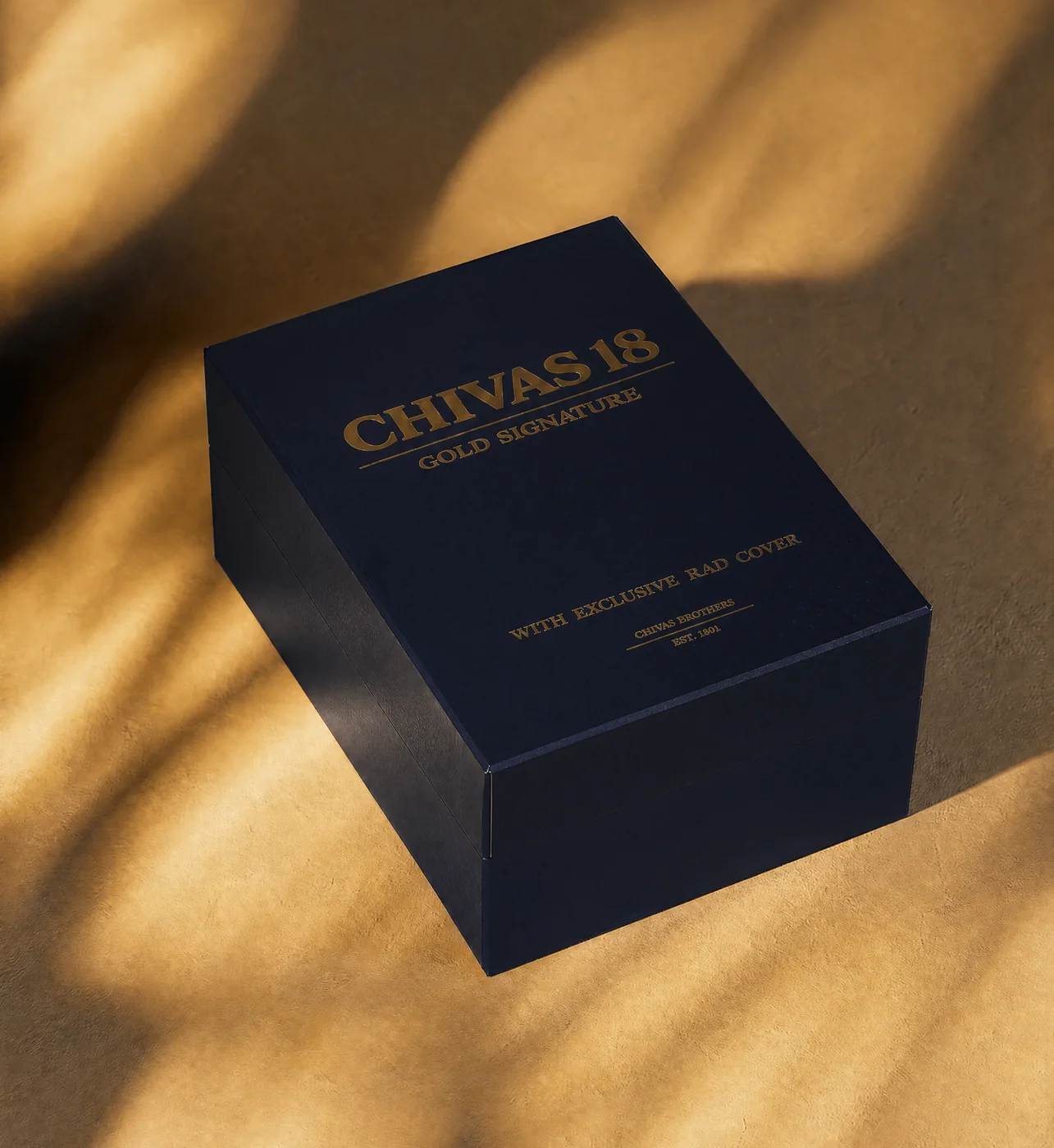 Chivas 18 Gold Signature rigid box, closed, gold foil on navy wrap