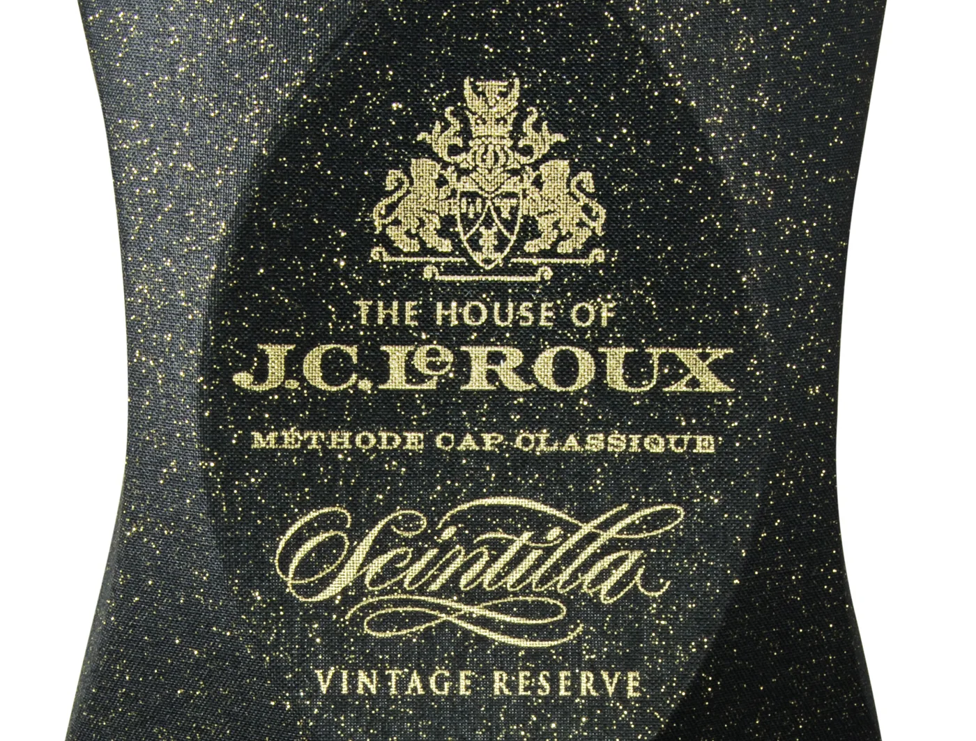 The first edition: black material flecked with gold, a nod to the bottle and its bubbles