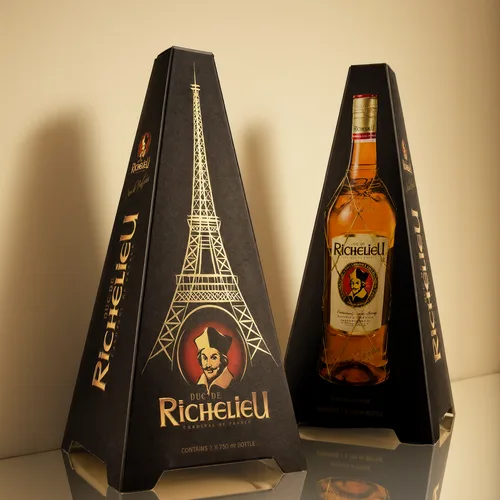 Richelieu brandy gift pack shaped like the Eiffel Tower, beside the bottle